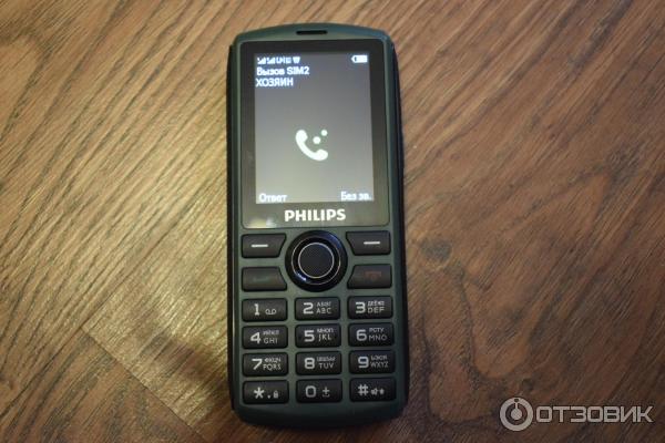 Мобильный телефон Philips Xenium E218 фото